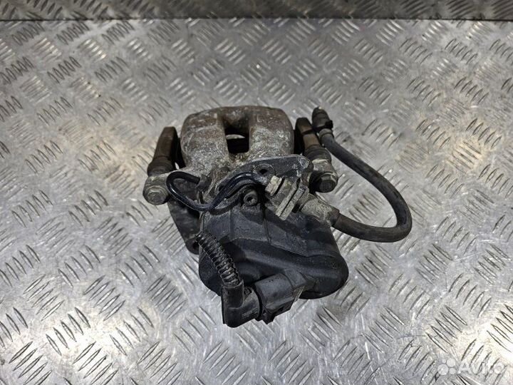 Суппорт задний правый Volkswagen Passat B6