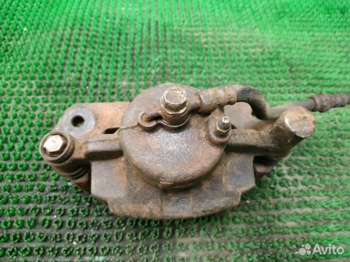 Суппорт передний левый Mazda 626 GE FS 1995