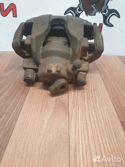 Суппорт тормозной передний правый Renault Sandero