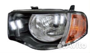 L200 фара левая механический корректор (TYC) (Tyc)