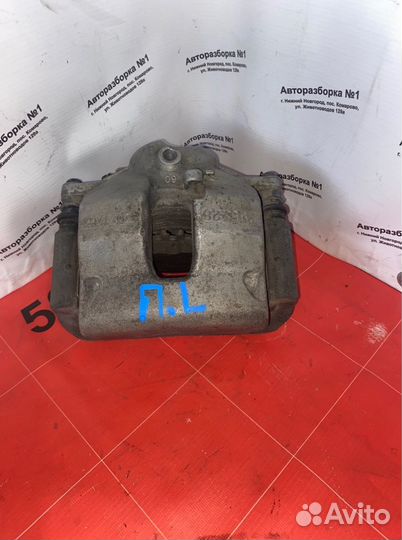 Суппорт тормозной передний левый Mercedes-Benz