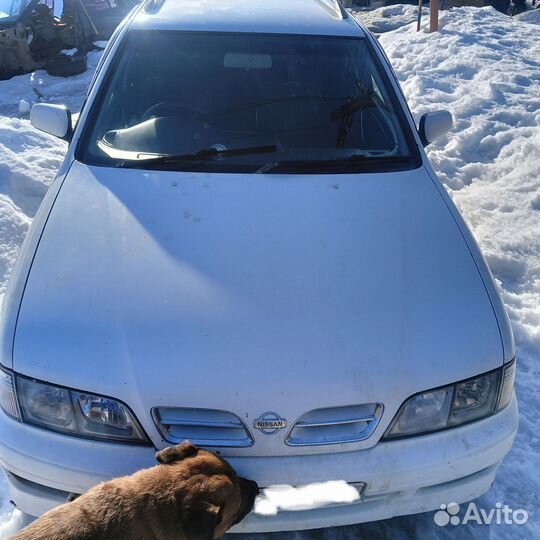 Решетка радиатора левая Nissan Primera P11 1999