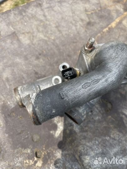 Корпус термостата Hyundai Elantra 3 XD ат G4GC