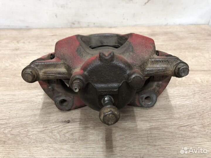 Суппорт передний левый Opel Astra j