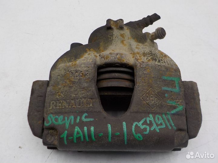 Суппорт тормозной передний левый Renault Scenic 20