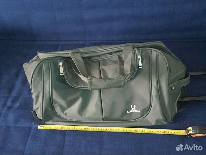 Сумка дорожная на колесах с выдвижной ручкой