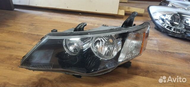 Фара левая Mitsubishi Outlander XL