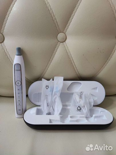 Электрическая зубная щетка Roaman