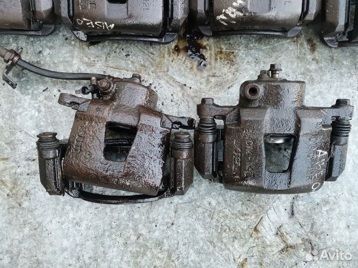 Суппорт тормозной передний левый Chevrolet Lacetti