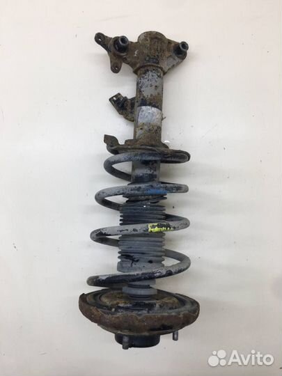 Амортизатор передний правый Nissan Primera P12 2002-2007