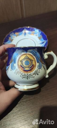 Фарфоровая кружка с блюдцем