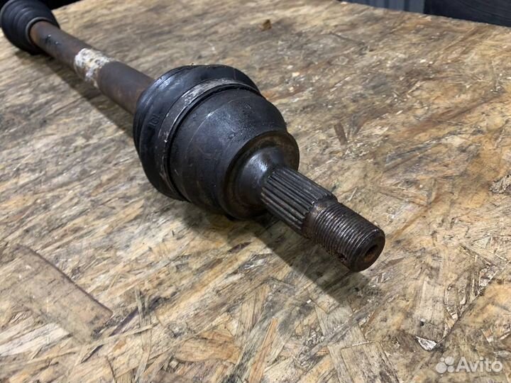 Приводной вал правый Peugeot 207