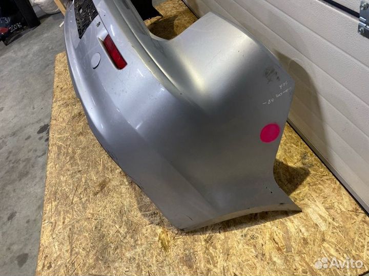 Бампер задний Mitsubishi Lancer