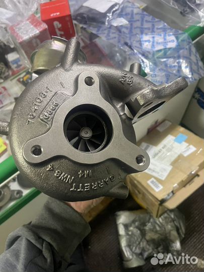 Новая Турбина оригинал Nissan 14411-EC00E Garrett