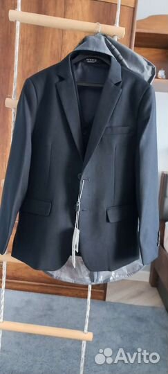 Школьная форма для мальчика 128 новая