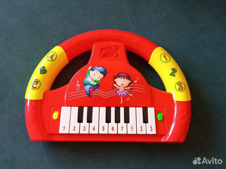 Интерактивная игрушка музыкальный руль пианино