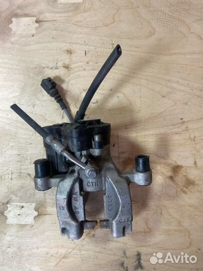 Суппорт тормозной задний правый Volkswagen Tiguan