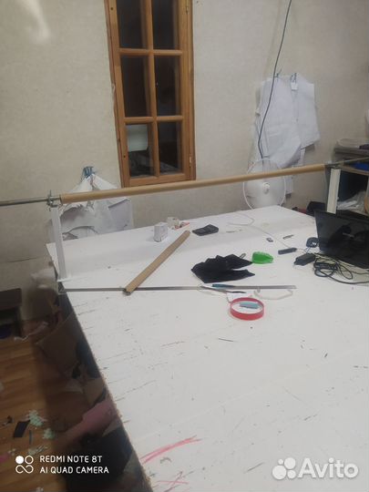 Размотчик для ткани для закройного стола