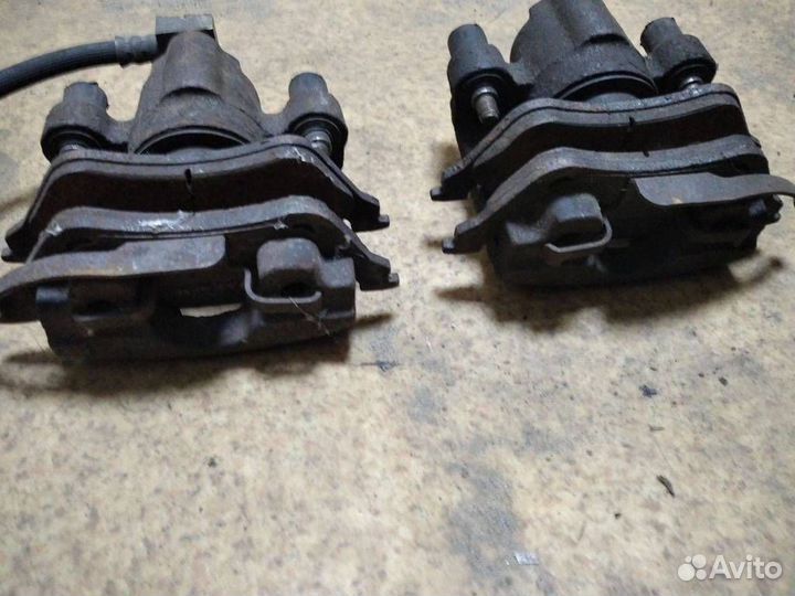 Суппорт тормозной задний Chrysler Voyager 4