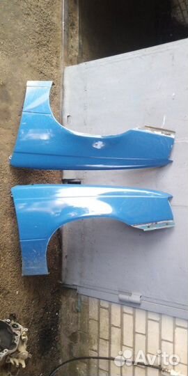 Крыло Opel Kadett E