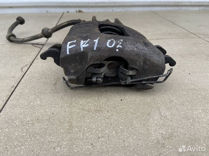 Тормозной суппорт передний правый Ford Focus 1