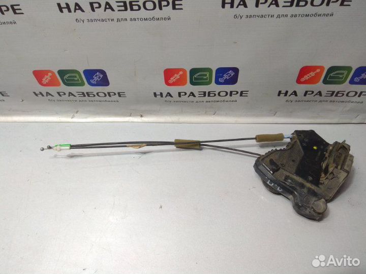 Замок двери передний правый Toyota Corolla E150