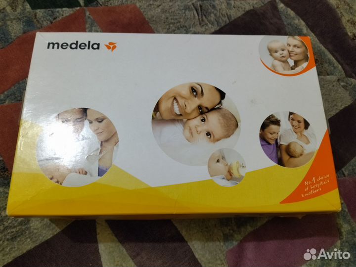Молокоотсос medela ручной