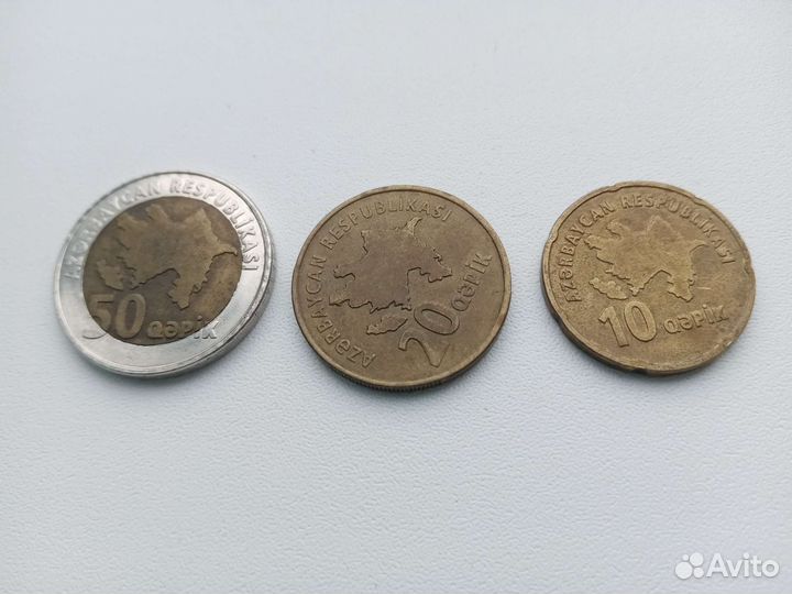 Монеты и значки