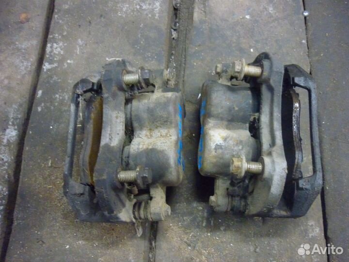 Тормозной суппорт передний на форд транзит 00- 06г