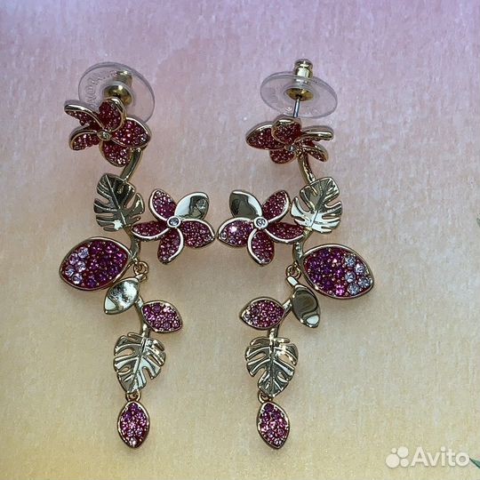 Swarovski разные серьги