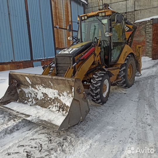 Услуги экскаватора погрузчика сат428 уборка снега