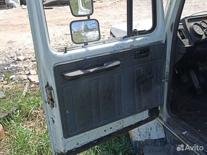 Дверь газ 3309