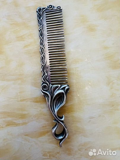Серебряная расческа