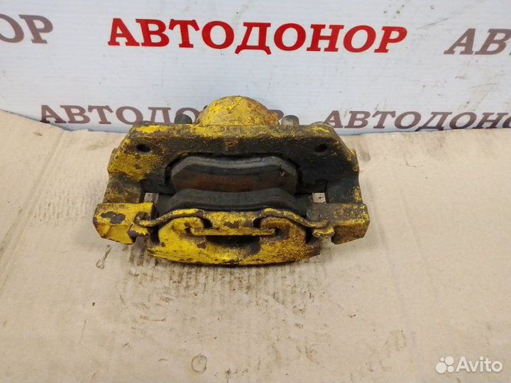 Суппорт тормозной передний левый Dodge Caravan 3.3