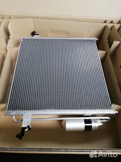 Радиатор кондиционера Mitsubishi L200 luzar
