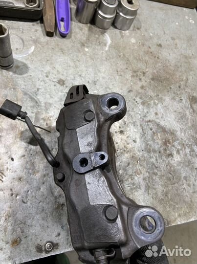 Суппорт тормозной задний левый 4х поршневой