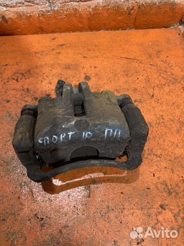 Суппорт передний правый Kia Sportage 2