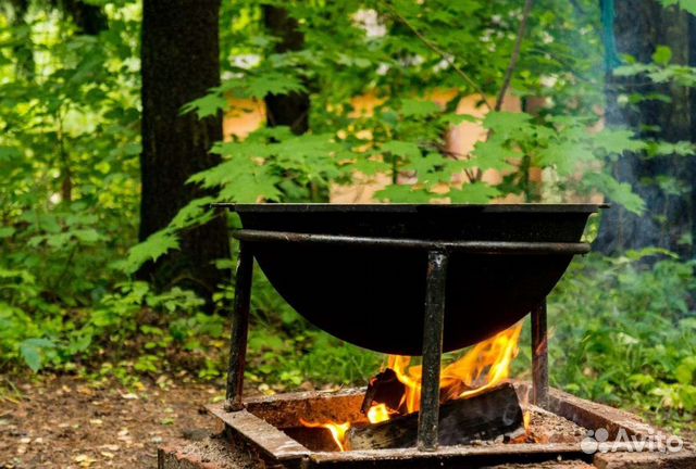 казан на костре. чугунные казаны на костре. афганский казан чугунный на костре. ведьмин котелок. казан на костре.