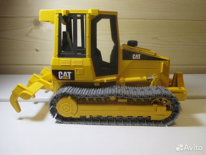 Игрушка модель Бульдозер CAT caterpillar bruder