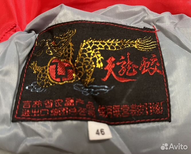 Жилетка пуховая женская