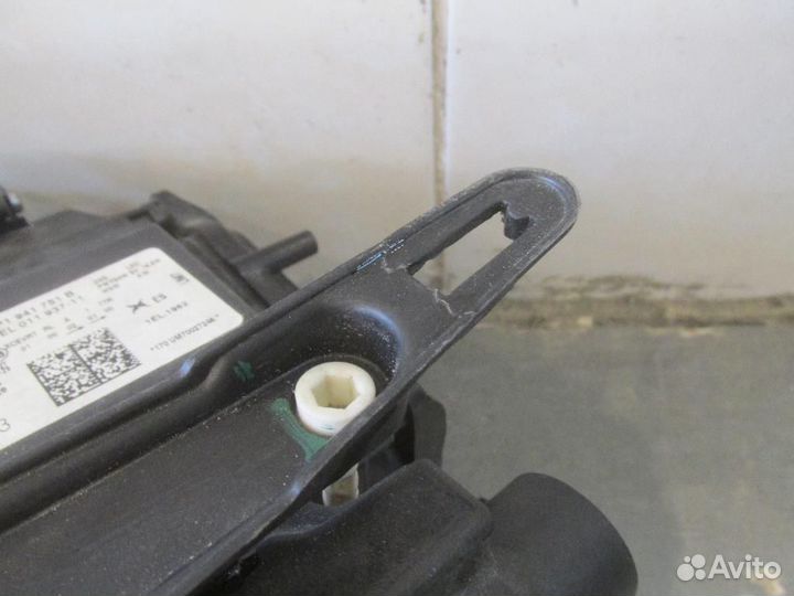 Фара левая Volkswagen Touareg