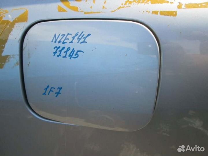 Лючок бензобака Toyota Corolla Fielder NZE141