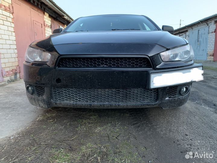 Решетки бампера mitsubishi lancer 10