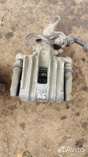 Суппорт задний левый правый Octavia A5 Golf Jetta5