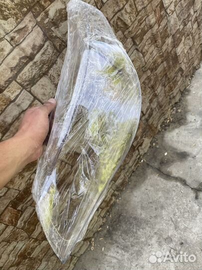 Стекло фары левой Бмв e60