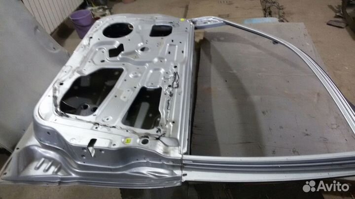 Митсубиси ланцер 9 дверь задняя