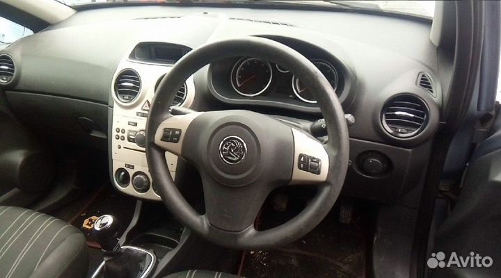 Суппорт тормозной передний левый opel corsa D