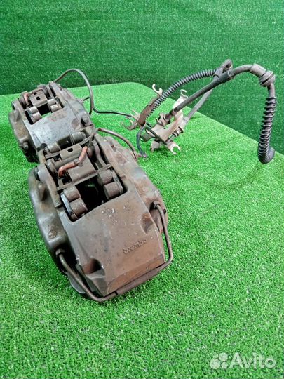 Суппорт тормозной (комплект) передний Volkswagen