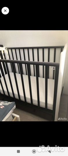 Детская кроватка с продольным маятником