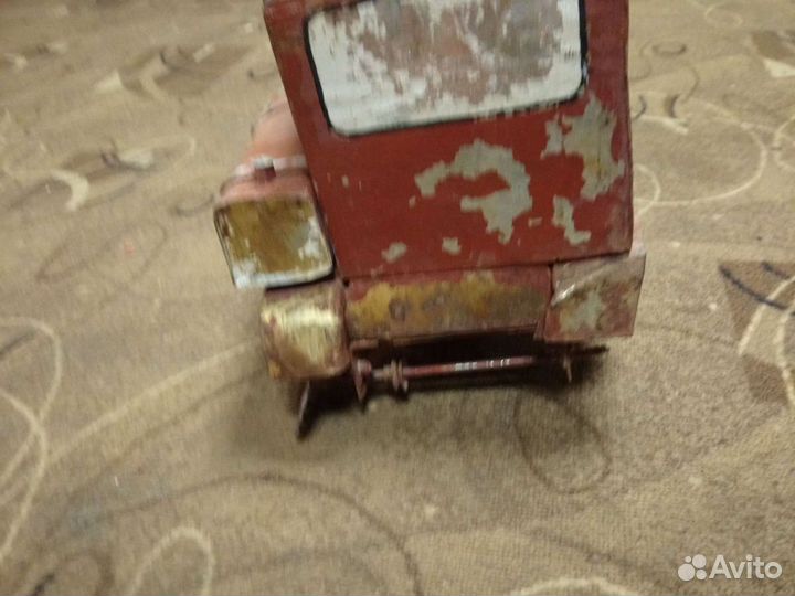 Игрушка трактор